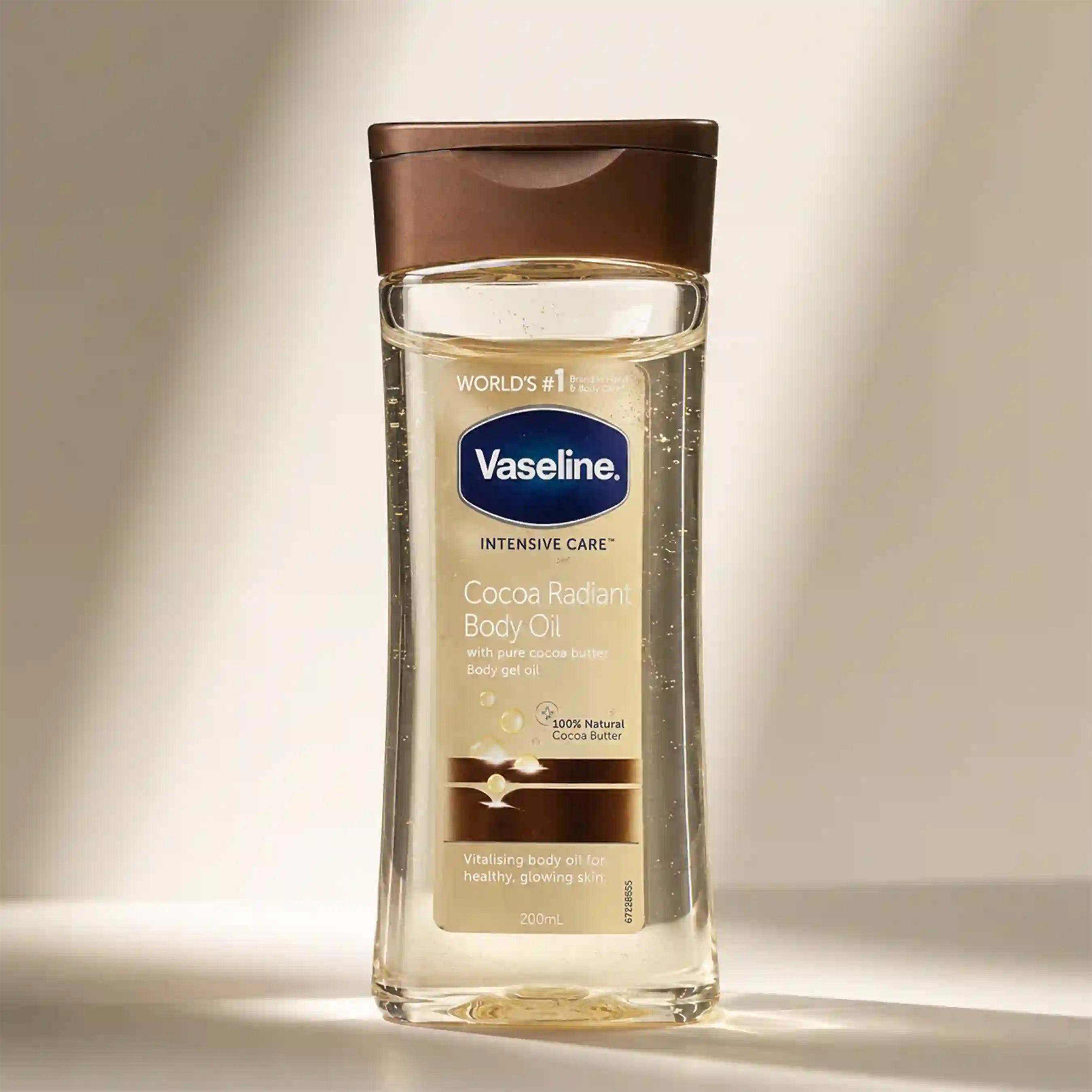 خرید و قیمت روغن بدن قهوه ای وازلين Vaseline Cocoa Radiant Body Oil 200ml