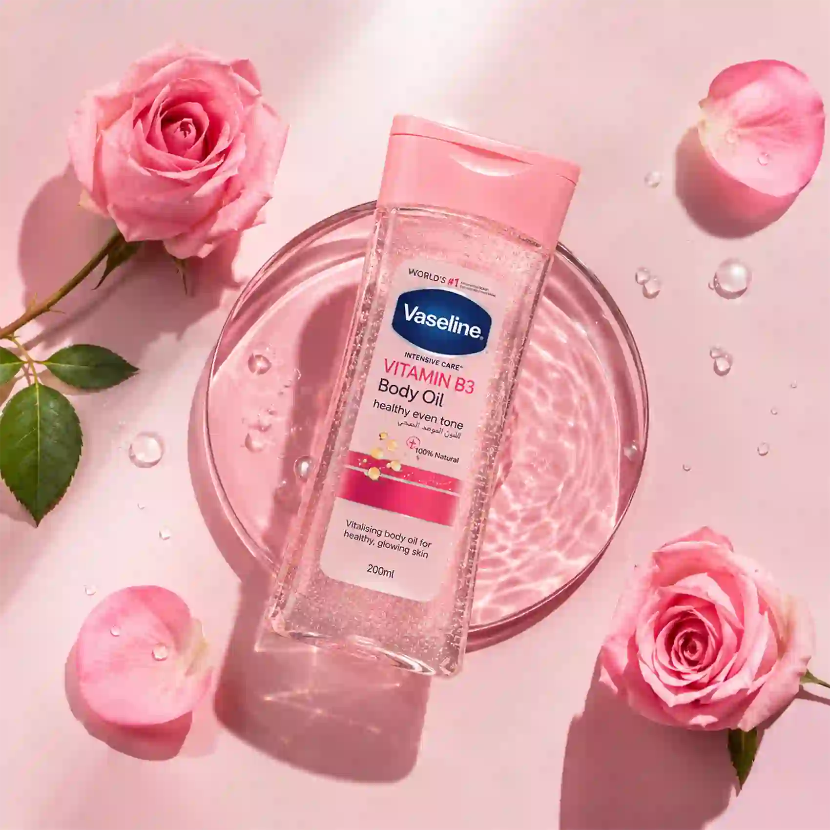 خرید و قیمت روغن بدن صورتی وازلين Vaseline Vitamin B3 Body Oil 200ml